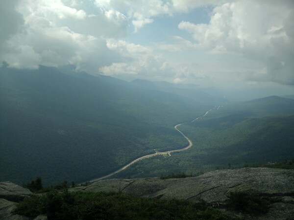 A view from the east face of Cannon Mountain, showing I-93 cutting through the White Mountains