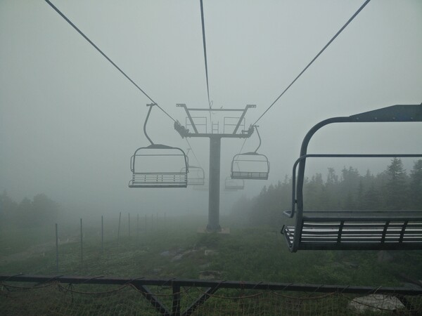 The Cannon Mountain Aerial Tramway, shrouded by fog