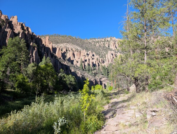 Jagged rock spires rise above the river