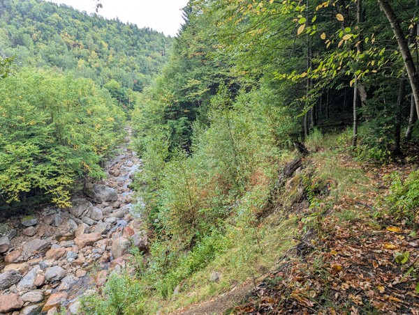 A section of the trail that almost washed out, high above the river