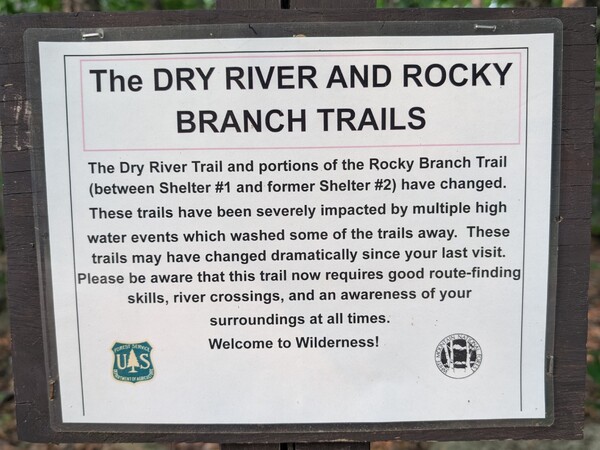 Sign at the Rocky Branch Trailhead warning that the trail had changed significantly due to washouts